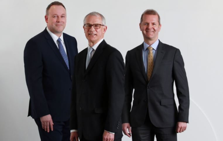 Alan Simpson with Anderson Strathern chairman Bruce Farquhar and energy group head Neil Farrell.