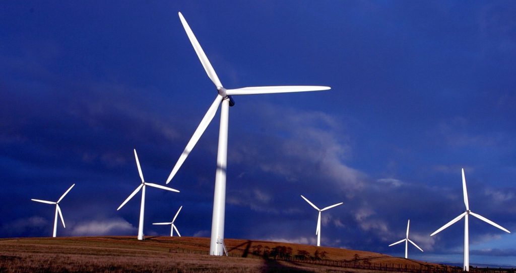 Four onshore wind turbines in Scotland.