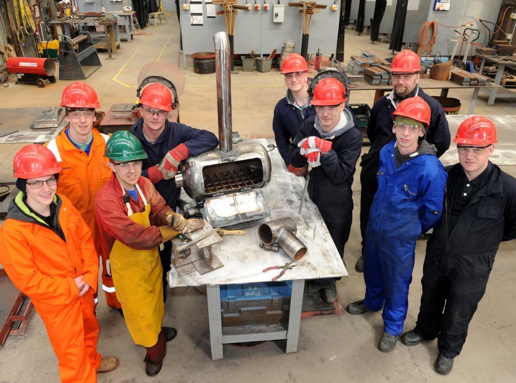 Picture by SANDY McCOOK  25th April '18
Nine students of the Global Skills Academy at Nigg have gained jobs at the end of their training with Global North Fabrication.   (L-R) Branden Clyde, Connor Gilour, Lewis Mackenzie, Robert Finnie, Ryan Grant,Robert Paterson, Paul Mooney, Richard O'Donnell and Shaun Ford.