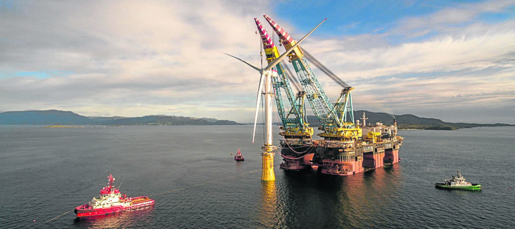 The Saipem 7000 crane vessel installing the Hywind turbine towers onto their foundations.
