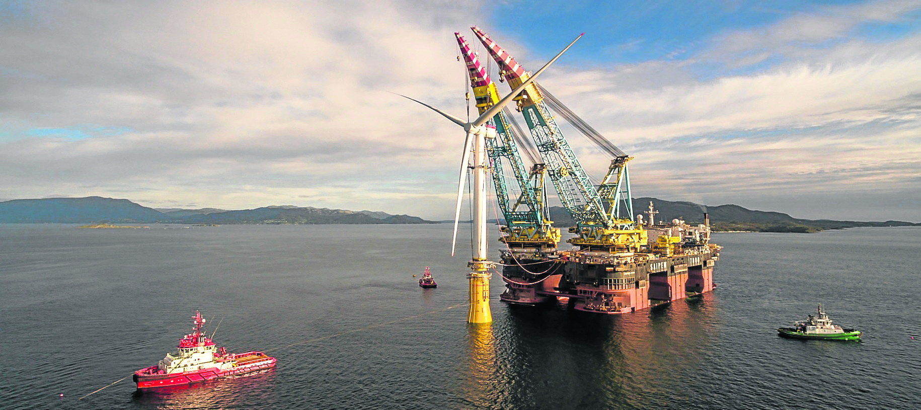 The Saipem 7000 crane vessel installing the Hywind turbine towers onto their foundations.