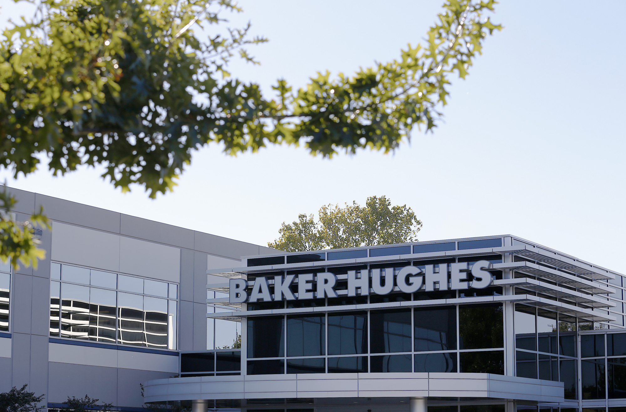 Baker Hughes Inc. signage is displayed at one of the company's facilities in Houston, Texas, U.S. Photographer: Aaron M. Sprecher/Bloomberg