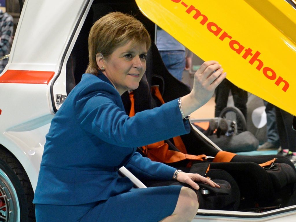 Scotland's First Minister Nicola Sturgeon with Miss K an urban concept car at the All Energy Exhibition Conference at the Scottish Event Campus in Glasgow.  May 2 2018.