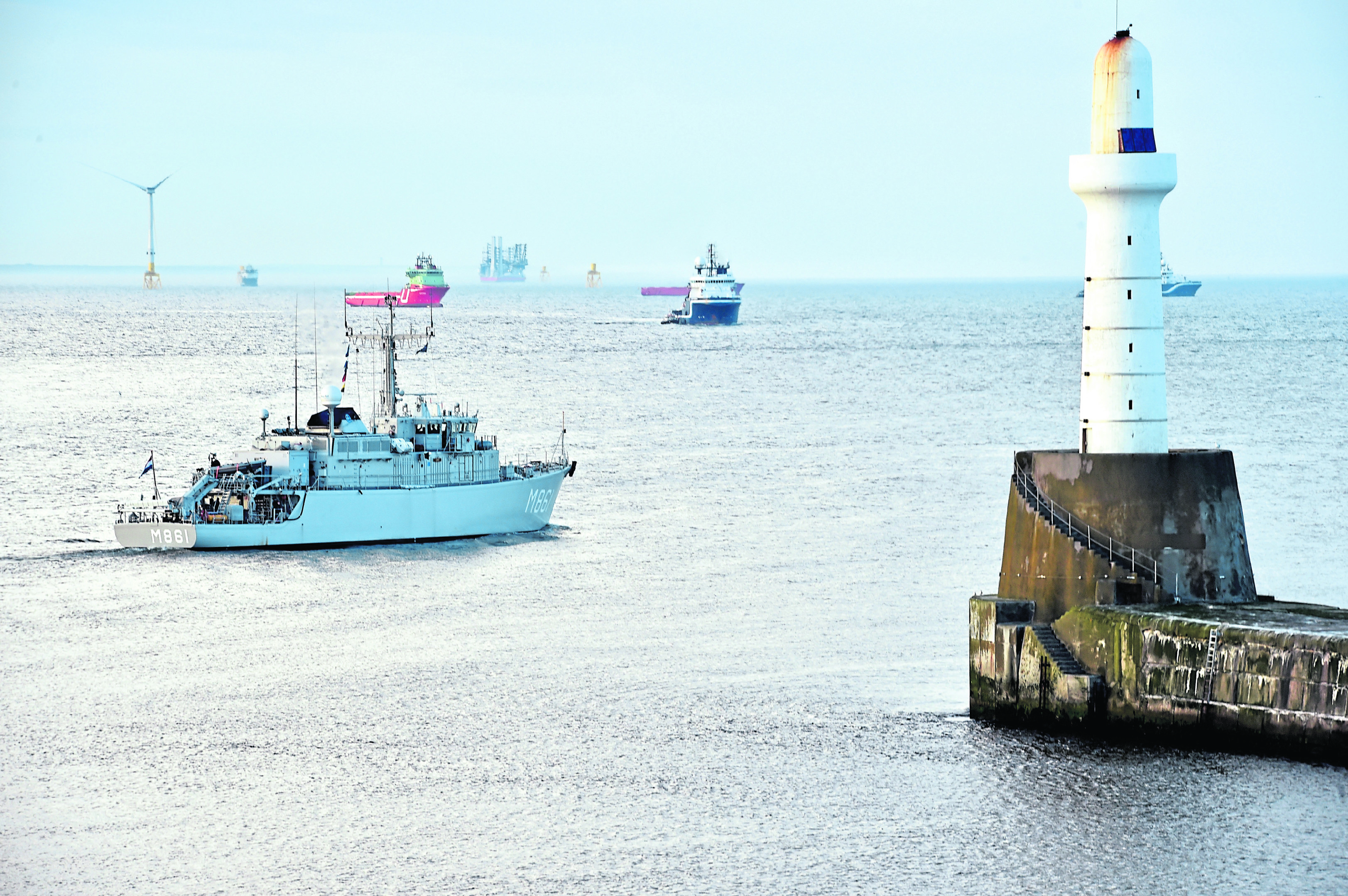 Three NATO ships left Aberdeen harbour on Saturday evening - Mercuur A900, Marcis M923 and Urk M861. Unfortunately they left separately leaving 10 minutes between each departure so was unable to photograph them together. PS note a dolphin at the nose of the A900 as it left Aberdeen.
Picture by COLIN RENNIE   May 5, 2018.