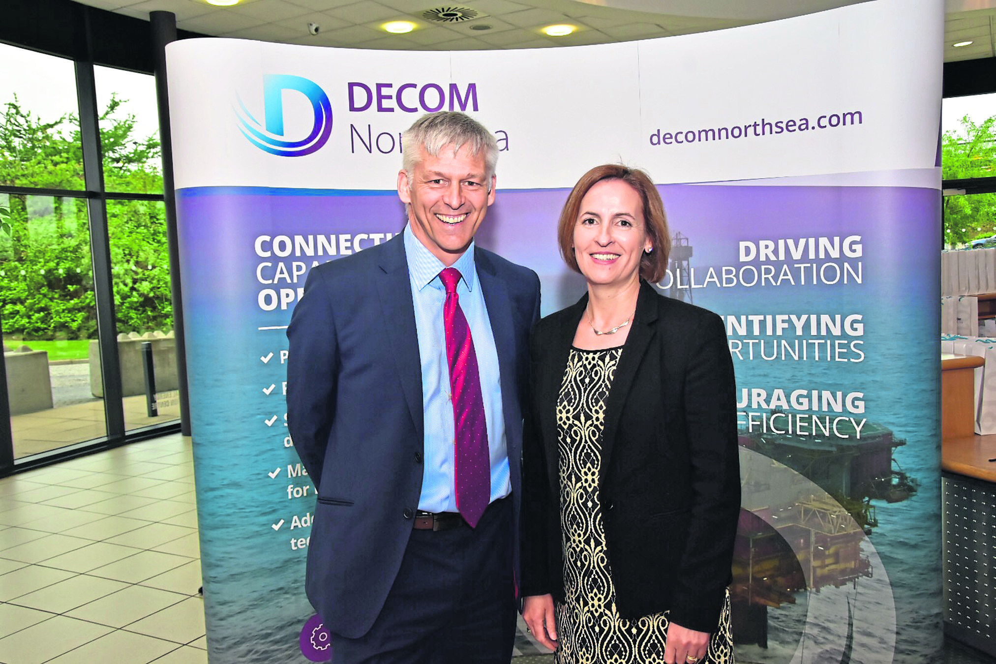 Tom Leeson, Decom North Sea interim CEO and Pauline Innes, who is collecting the Contribution to Decommissioning Award on behalf of Mark Bayman.