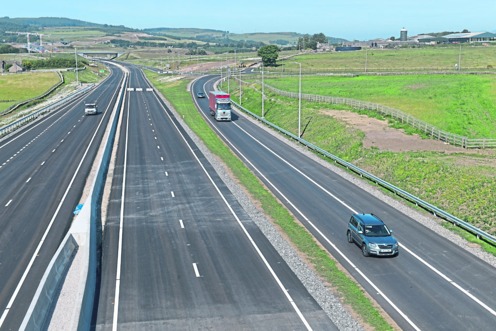 open: Drivers take advantage of the first stretch of the Aberdeen Western Peripheral Route yesterday.