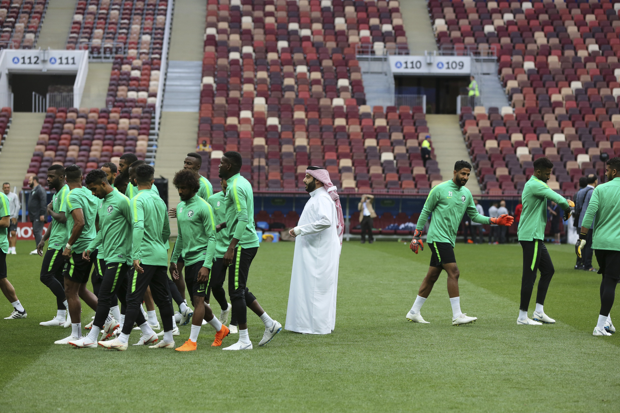 Turki Al Sheikh, Saudi Arabia's sports minister, center, joins the Saudi Arabia football team during a practice session ahead of the FIFA World Cup opening match at the Luzhniki stadium in Moscow, Russia, on Wednesday, June 13, 2018.  Photographer: Andrey Rudakov/Bloomberg