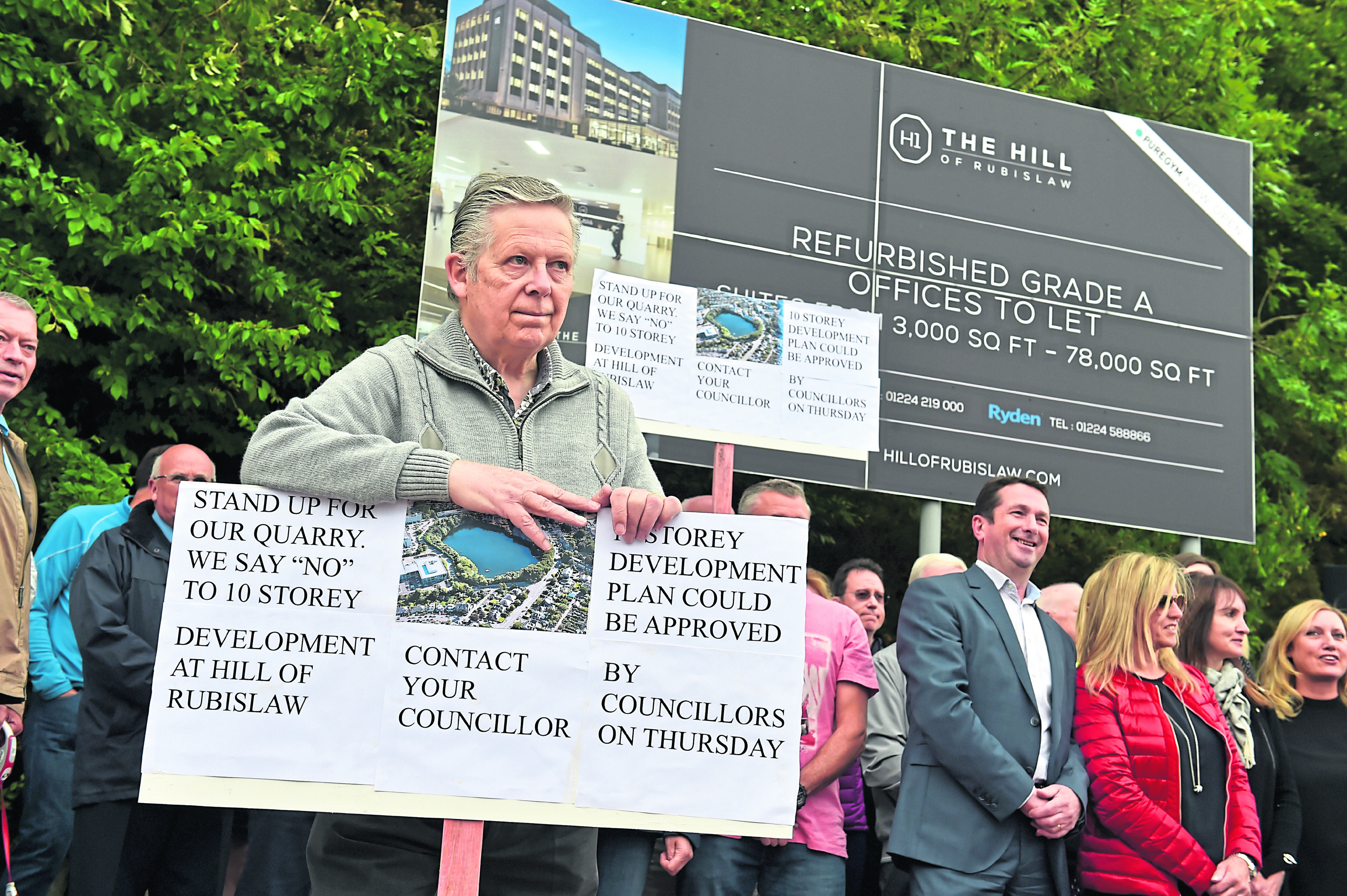 William Sell, secretary of Craigiebuckler and Seafield Community Council, with protesters at Rubislaw Quarry. Photograph by Kenny Elrick