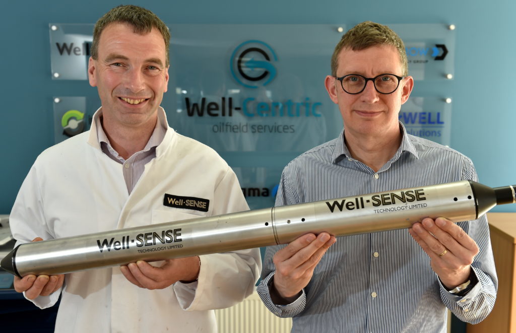 (L-R) Dan Purkis, technology director at Well-Sense Technology, and Stuart Ferguson, chief executive of FrontRow Energy Techology Group, holding an FLI system.