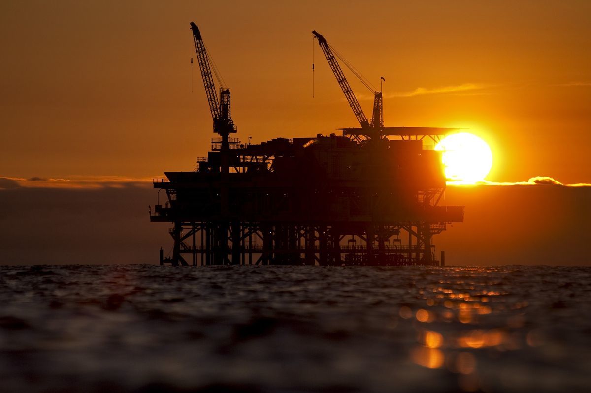DCOR LLC's Edith offshore oil and gas platform stands at sunset in the Beta Field off the coast of Long Beach, California, U.S. Photographer: Tim Rue/