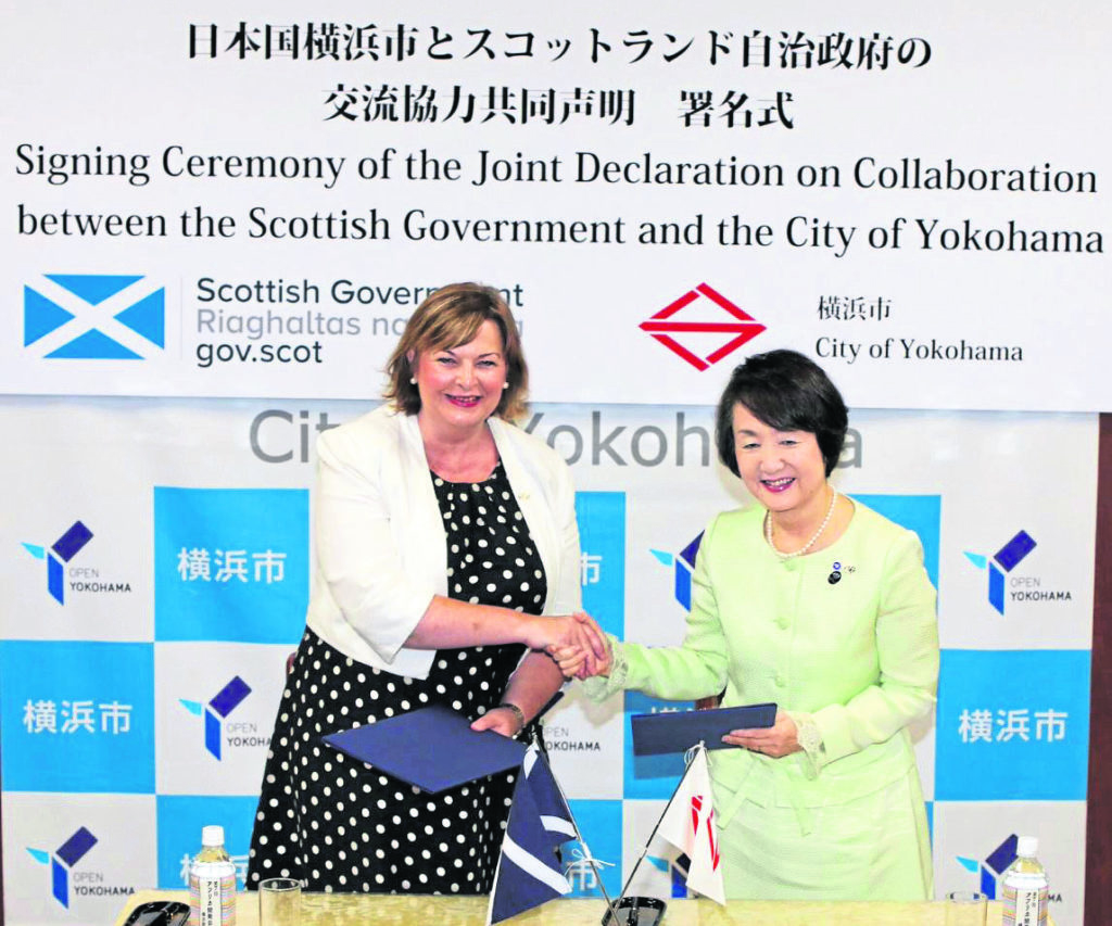 DEAL: External Affairs Secretary Fiona Hyslop shakes hands on the agreement for closer links with Yokohama mayor Fumiko Hayashi
