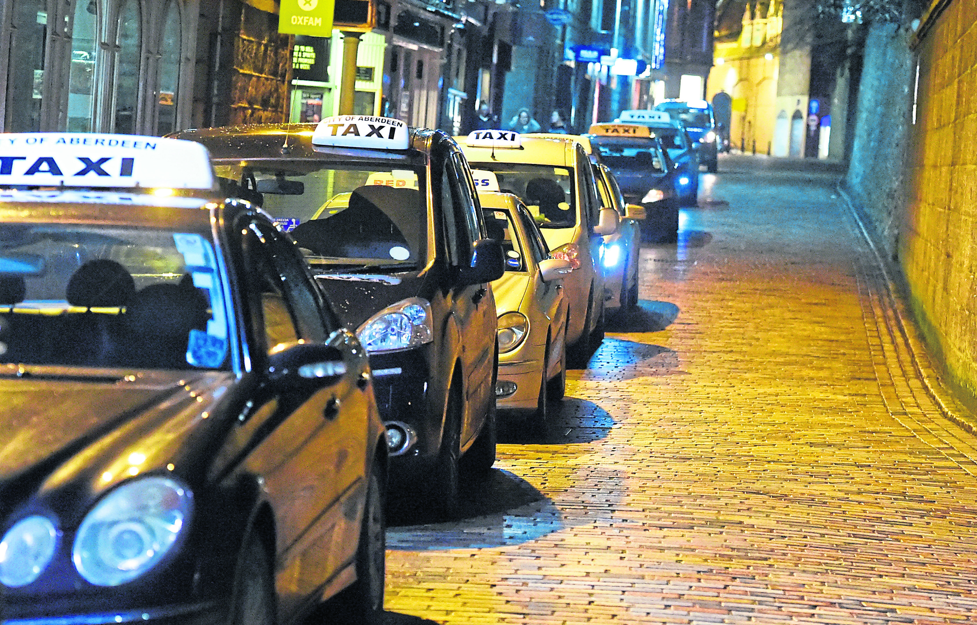 The start of UBER taxis in Aberdeen. In the picture is the Back Wynd taxi rank.  
Picture by Jim Irvine  4-1-17