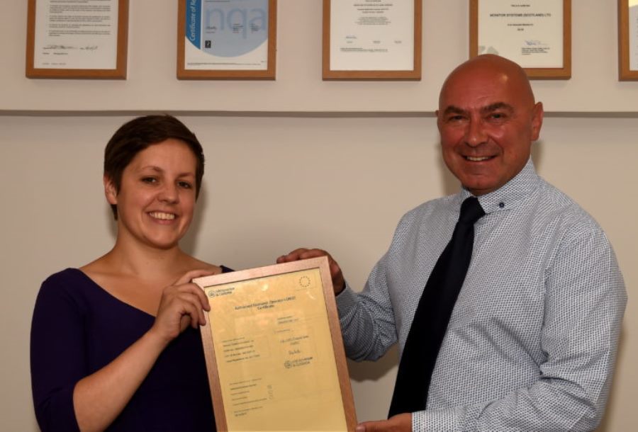 Aberdeen South MP (pictured while still a city councillor) Kirsty Blackman presents Brian Sinclair, Monitor Systems Scotland Limited, Aberdeen with their award. 
Picture by Jim Irvine  6-7-18