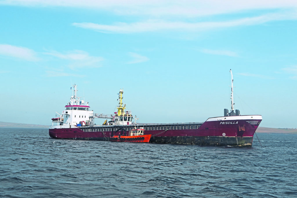 Ship stuck
The cargo vessel MV Priscilla safely berthed in Scapa Fow after being pulled off the Pentland Skerries. pic orkney photographic