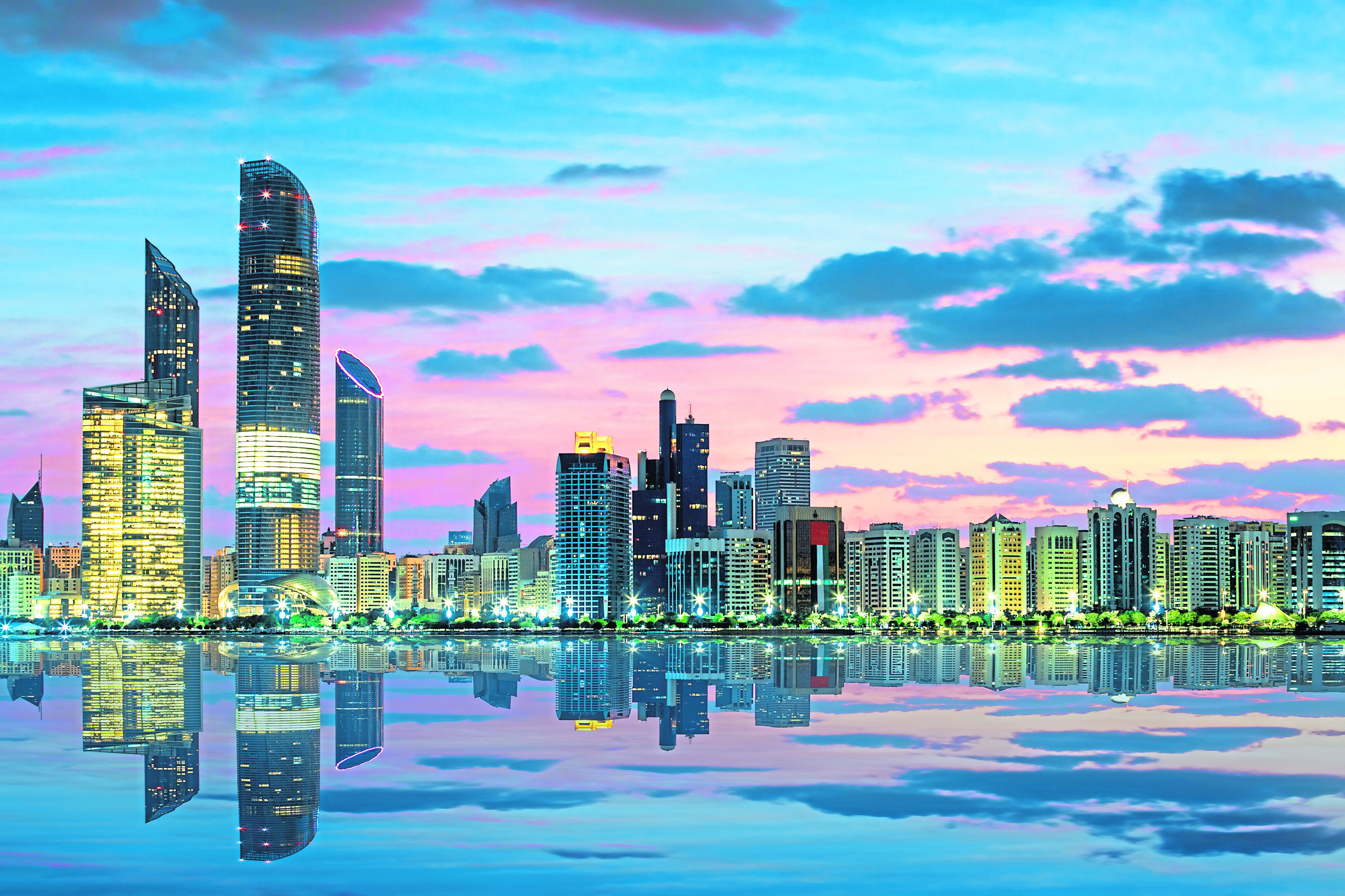 View of Abu Dhabi Skyline at sunset, United Arab Emirates