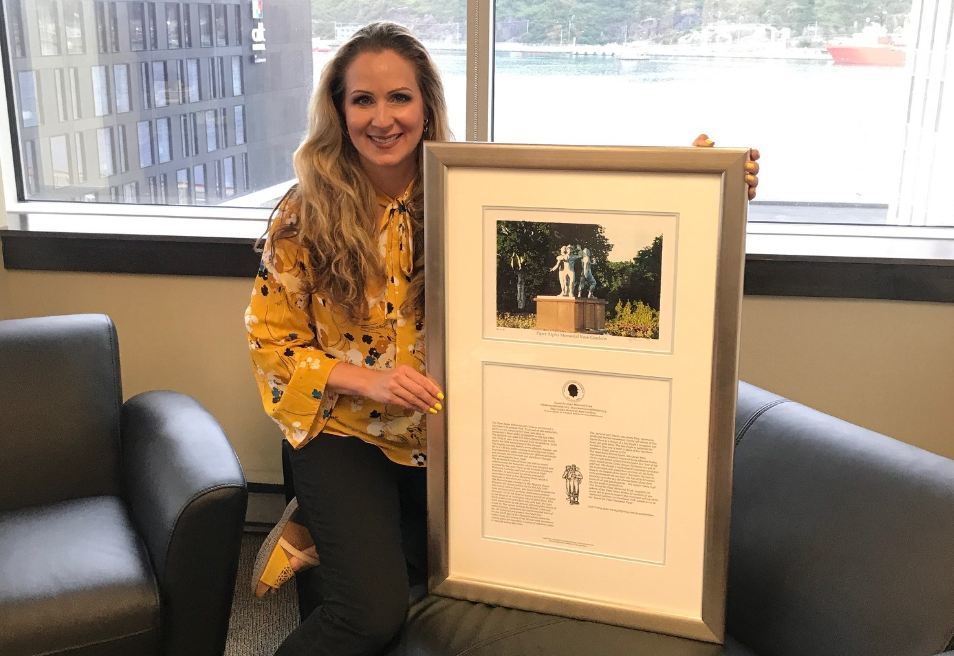 The prints have so far gone far and wide - pictured is Jill MacKey, lead safety officer from the Canada-Newfoundland and Labrador Offshore Petroleum Board who purchased a board in memory of lives lost in the Ocean Ranger disaster of 1982.