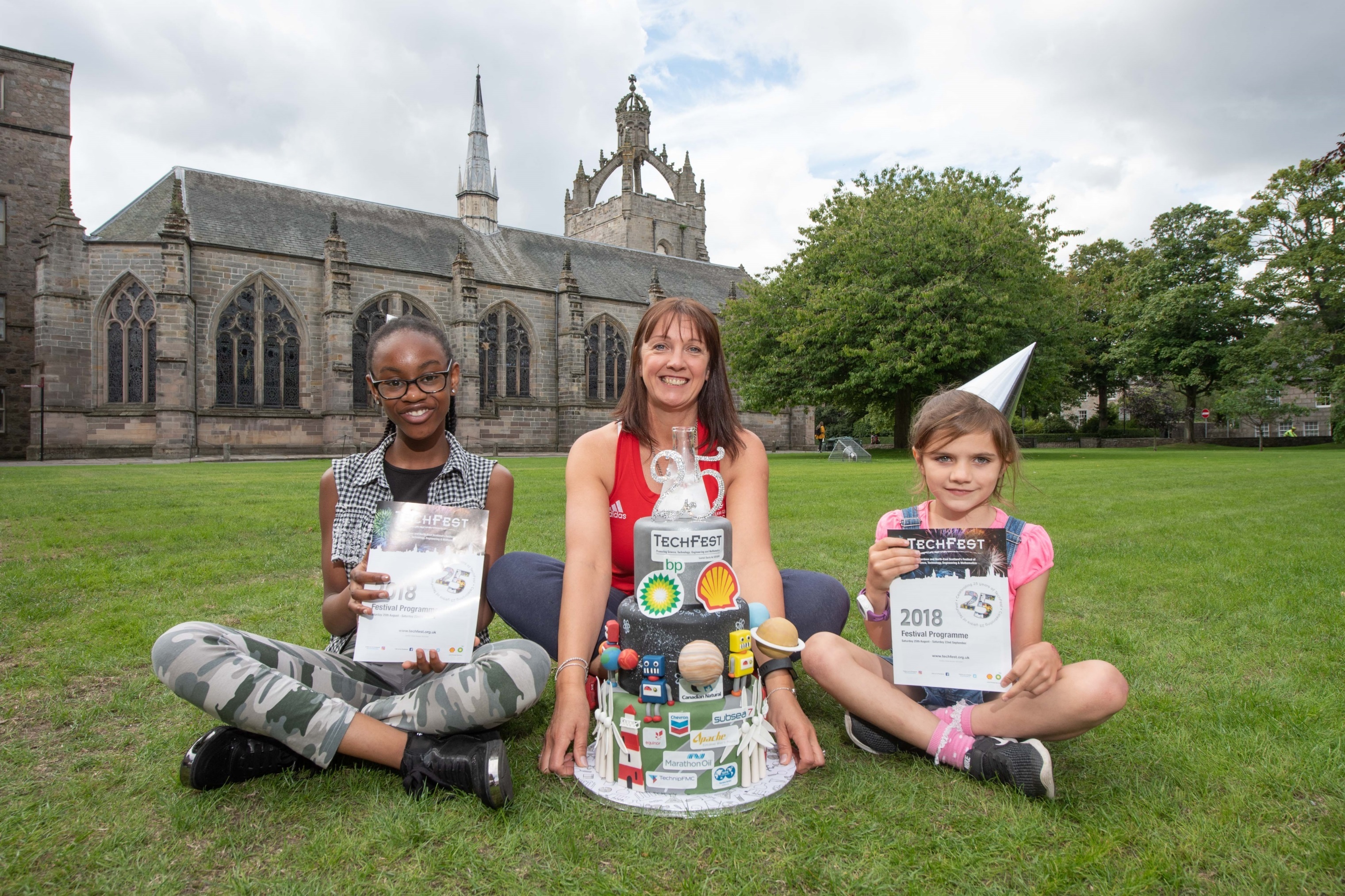 (L-R) Ayo Atti (13) from St. Margaret’s School for Girls Aberdeen, Jackie Lockhart (curling silver medallist) and Emma Chew (7) from Drumoak Primary