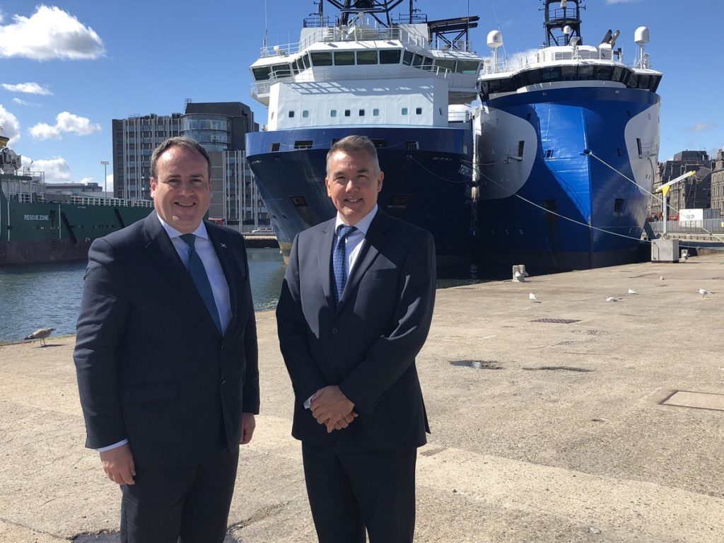 Scottish energy minister Paul Wheelhouse with newly-appointed CEO of Decom North Sea John Warrender at Aberdeen harbour.