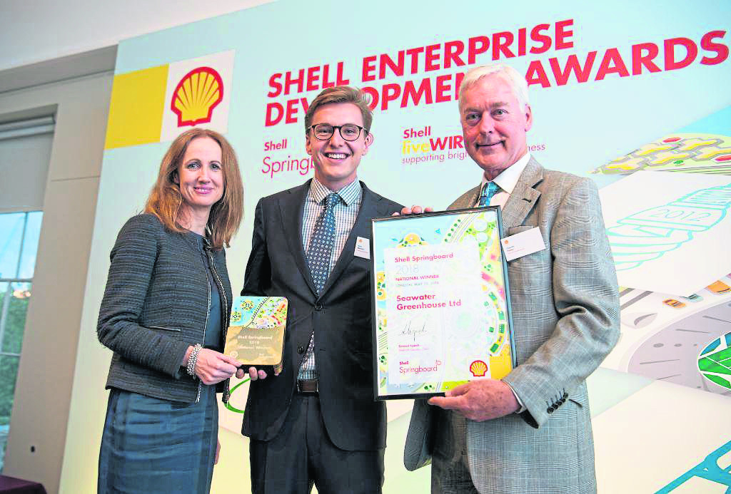 Sinead Lynch, Shell UK Country Chair, Karl Fletcher, head of business development at Seawater Greenhouse, and Charlie Paton, a director of Seawater Greenhouse, celebrate winning the award