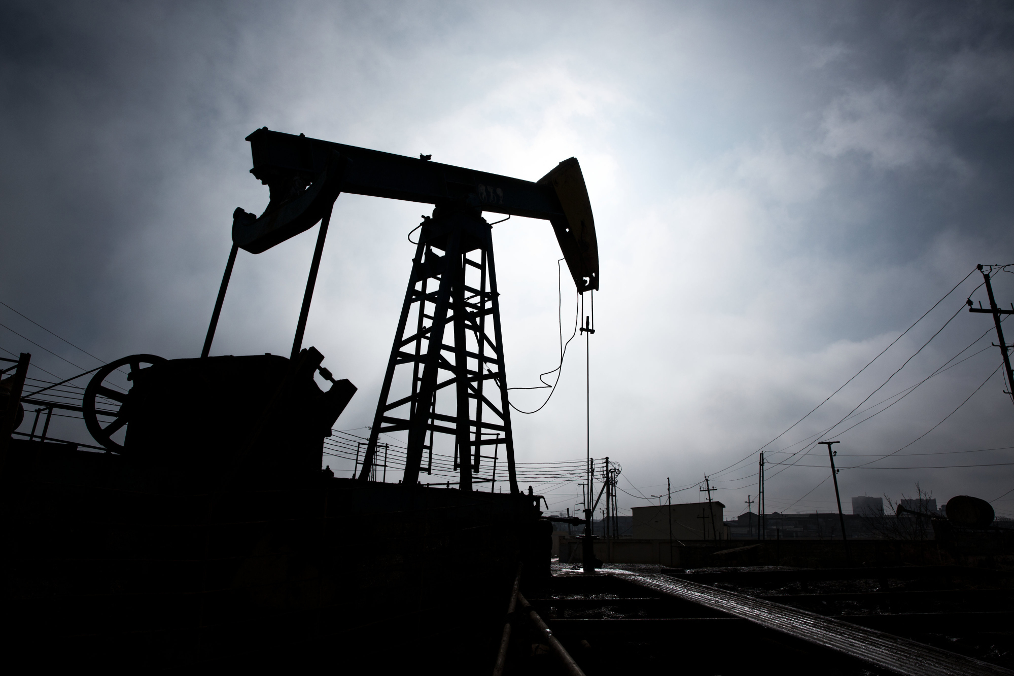 A pumpjack is silhouetted as it operates in Baku, Azerbaijan, on Sunday, March 18, 2018. Photograph: Taylor Weidman/Bloomberg Photographer: Taylor Weidman/Bloomberg