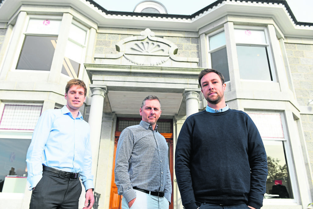 From left, Calum Martin, Greg Muir and Tom Sargent at Katoni Engineering. Photograph by Kami Thomson