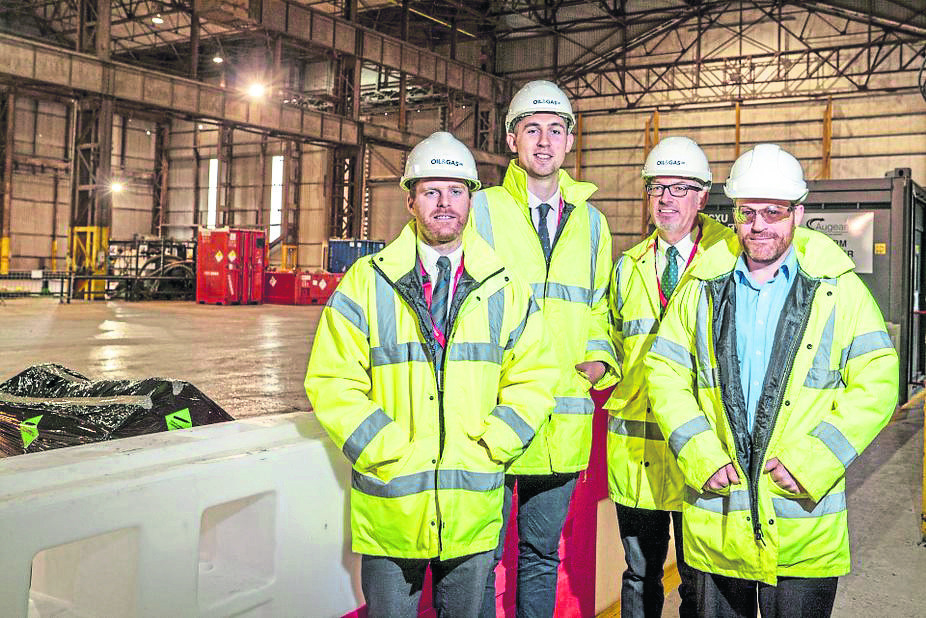 Jaibo Palmer, head of decomissioning at Augean North Sea Services, far right, with, Oil and Gas UK decommissioning team members, l-r, Joe Leask, Sam George and Richard Heard