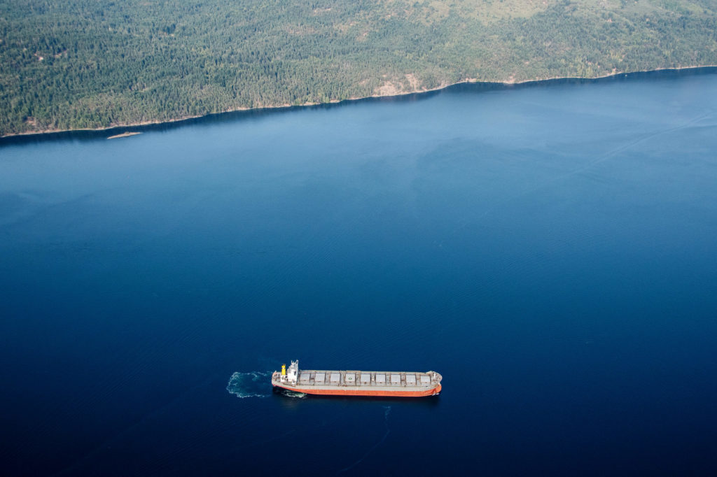 A tanker ship sits anchored in this aerial photograph taken above Saanich Inlet, British Columbia, Canada, on Sunday, Aug. 12, 2018. Canada is scheduled to release its second-quarter gross domestic product (GDP) figures on August 30. Photographer: James MacDonald/Bloomberg