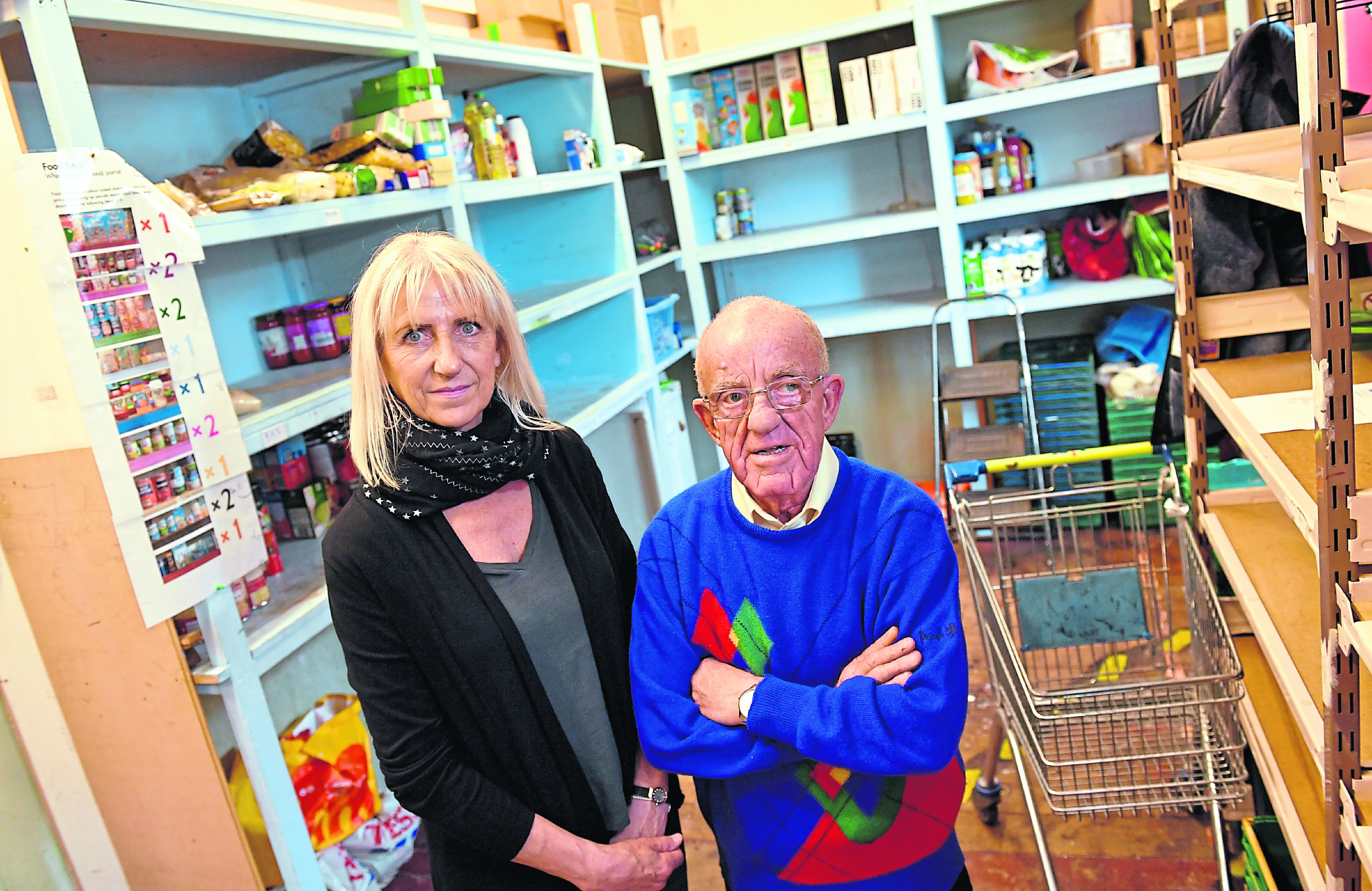 Pictured - Dot Goldie Office Manager and Dougie McDonagh Foodbank Volunteers at Instant Neighbour, St Machar, Aberdeen.    
Picture by Kami Thomson