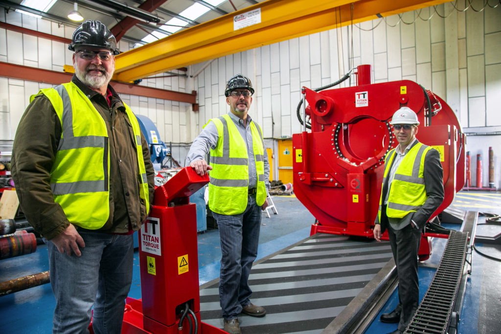 Titan directors Bruce Jepp (left) and Keith Gaskin, with Barry Marshall, business development director at EnerQuip (right) next to the new torque machine