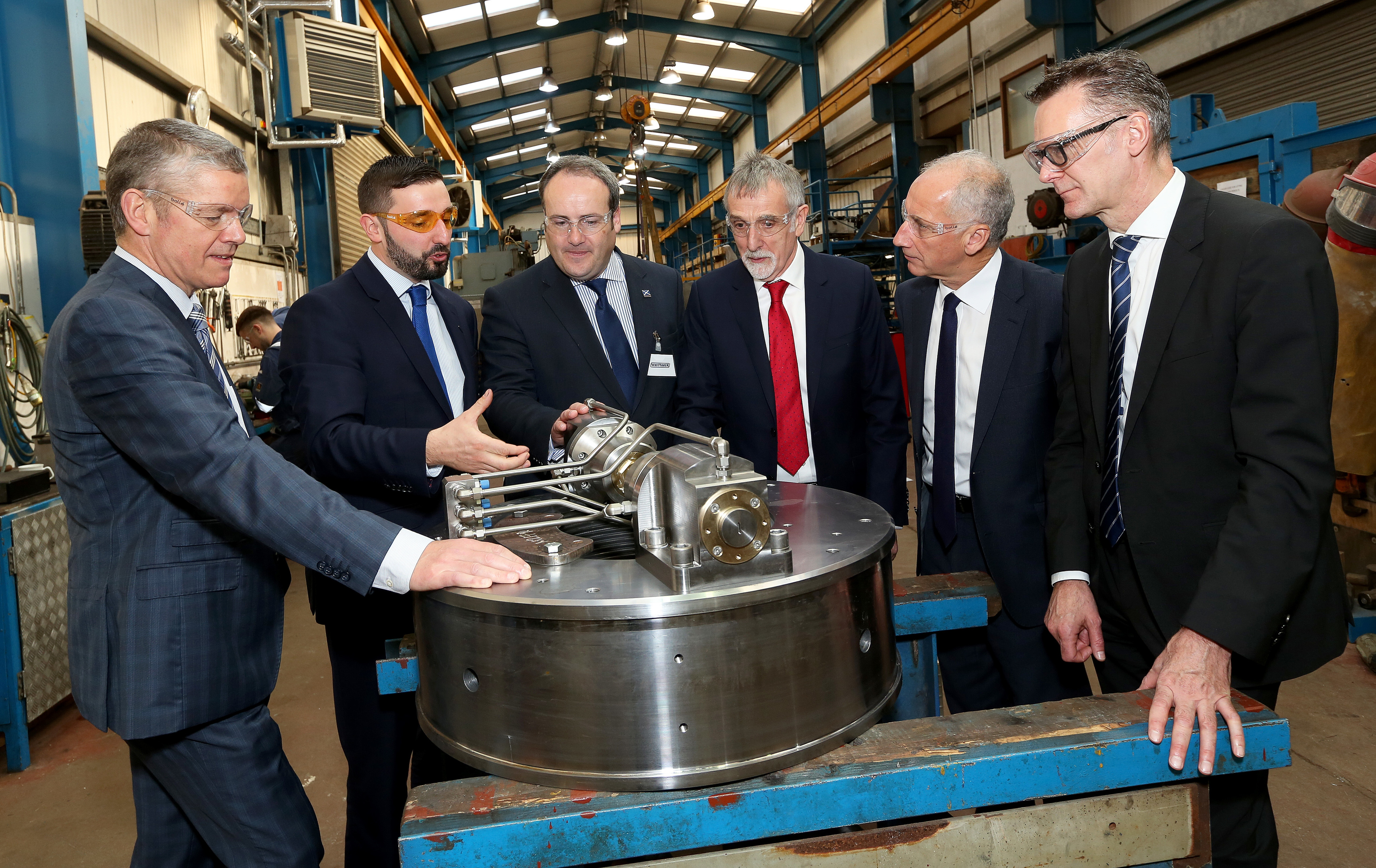 Energy minister Paul Wheelhouse, third from left, made the announcement during a visit to Whittaker Engineering near Stonehaven