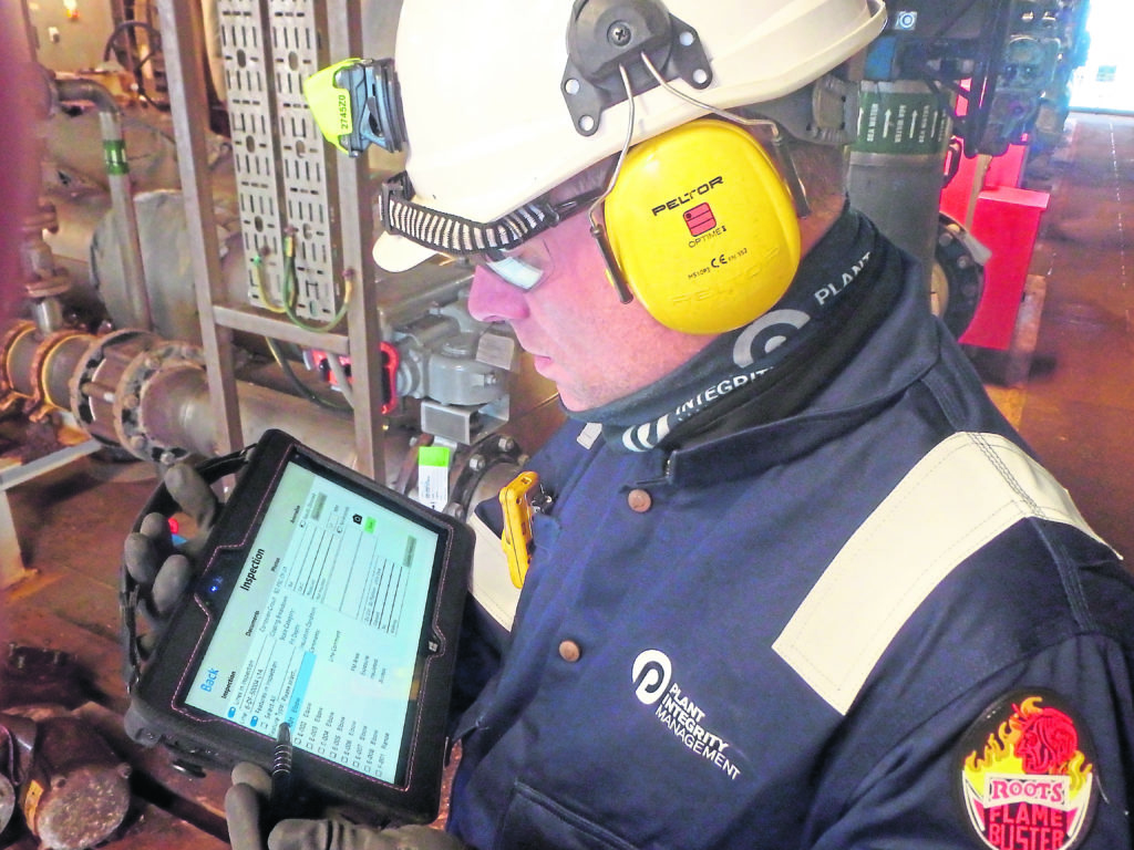 SYNCHRONICITY: Workers can download workpacks from a server and record inspection information on a tablet