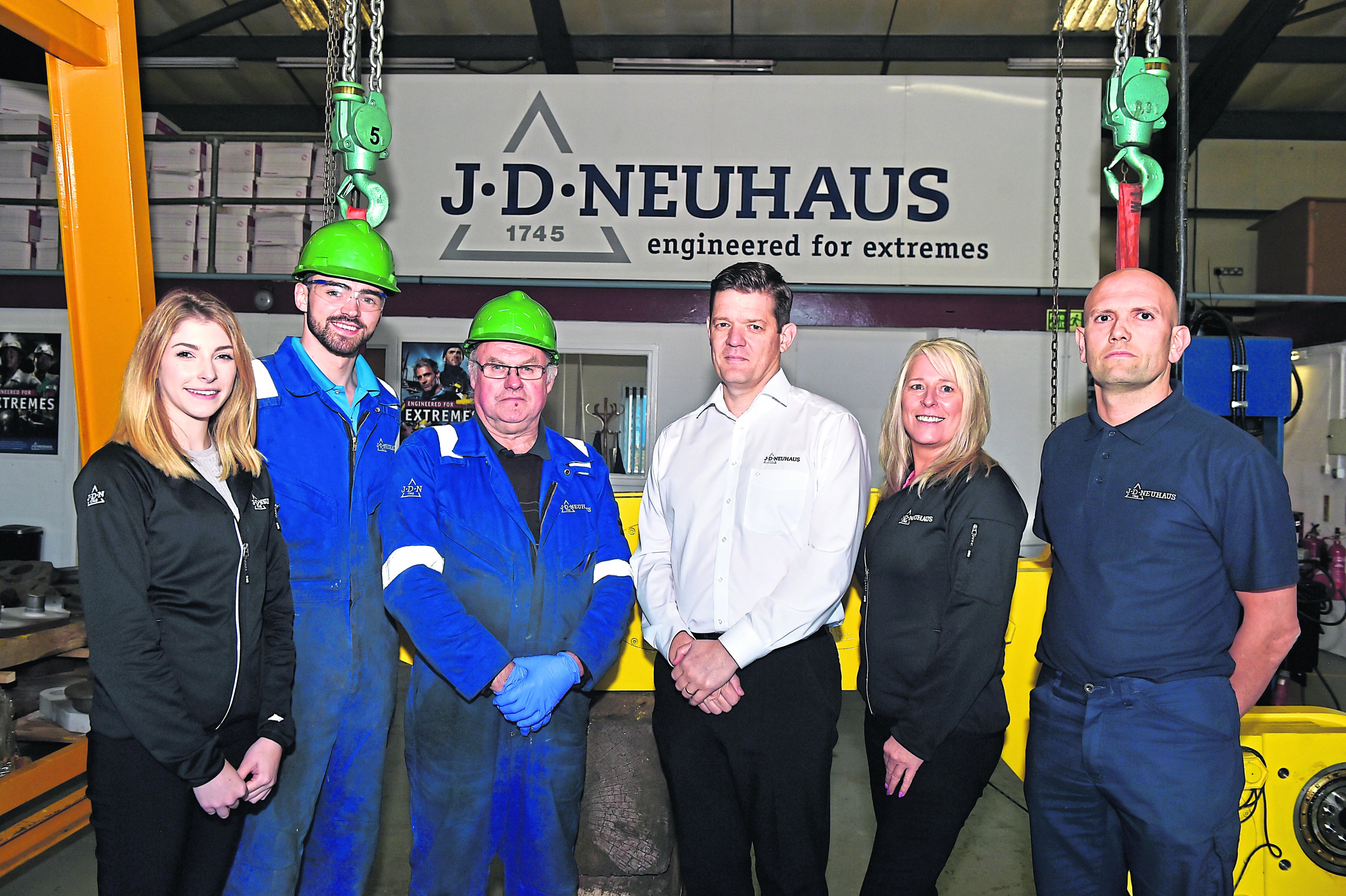 TEAMWORK:  Ashley Henderson, Grant Burnett, Jim Fraser, MD Steve Walker, Elaine Fraser and Paul Reid, helping                           JD Neuhaus serve the oil and gas sector with class-leading technology, and deliver the “vision of growth”