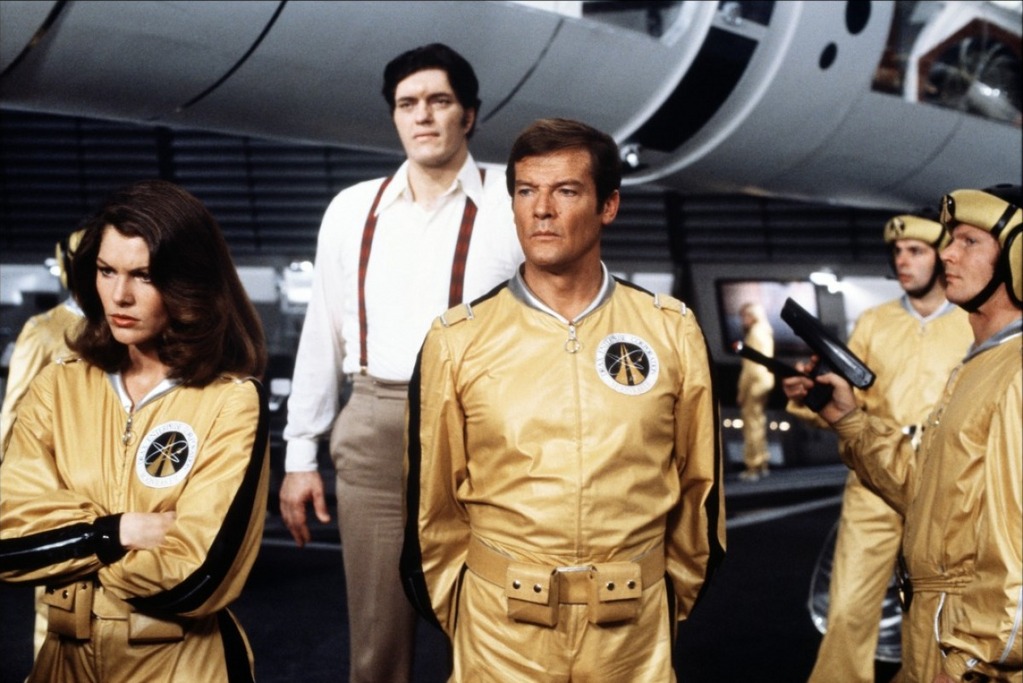 Roger Moore, centre, starring as James Bond in Moonraker.