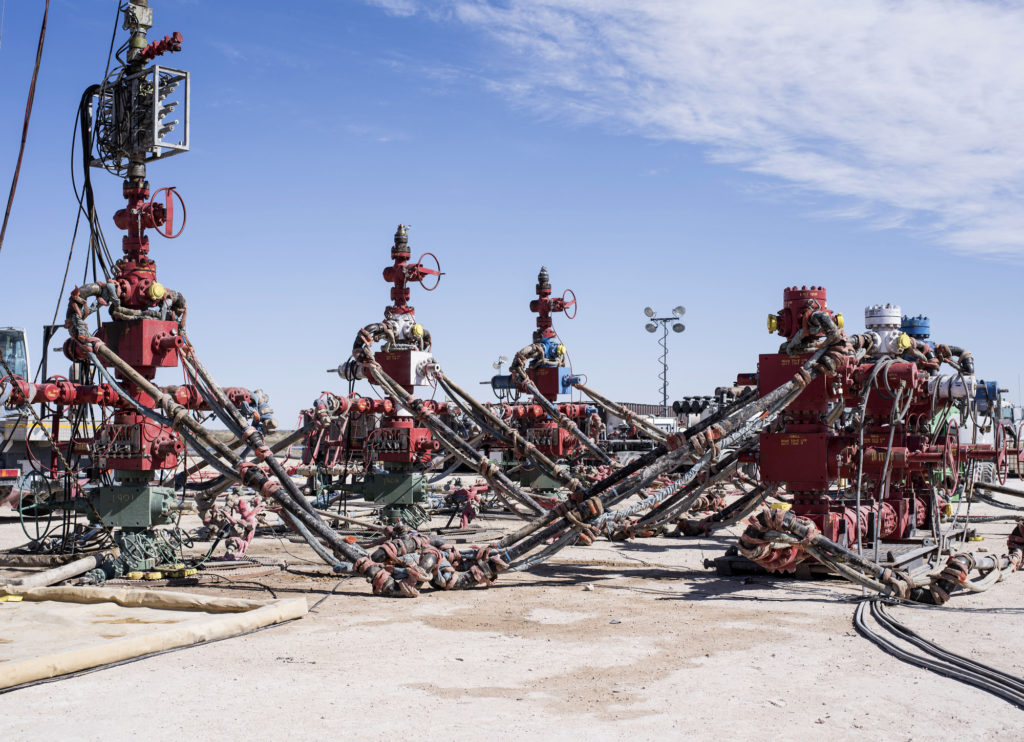 Machinery used to fracture shale formations stands at a Royal Dutch Shell Plc hydraulic fracking site near Mentone, Texas, U.S., on Thursday, March 2, 2017.  Photographer: Matthew Busch/Bloomberg