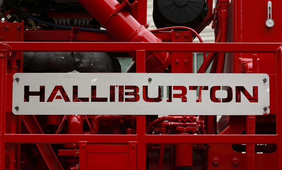 Halliburton logo against red machinery