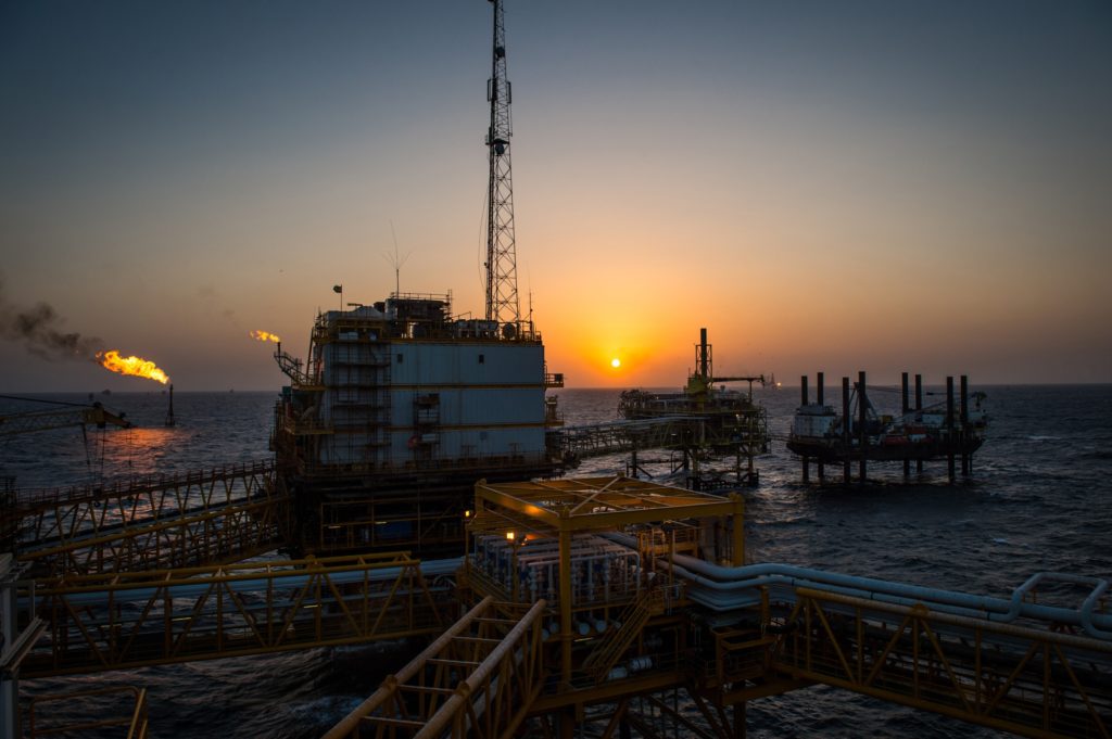 Gas flares burn from pipes aboard an offshore oil platform in the Persian Gulf's Salman Oil Field, operated by the National Iranian Offshore Oil Co., near Lavan island, Iran, on Thursday, Jan. 5. 2017. Photographer: Ali Mohammadi/Bloomberg