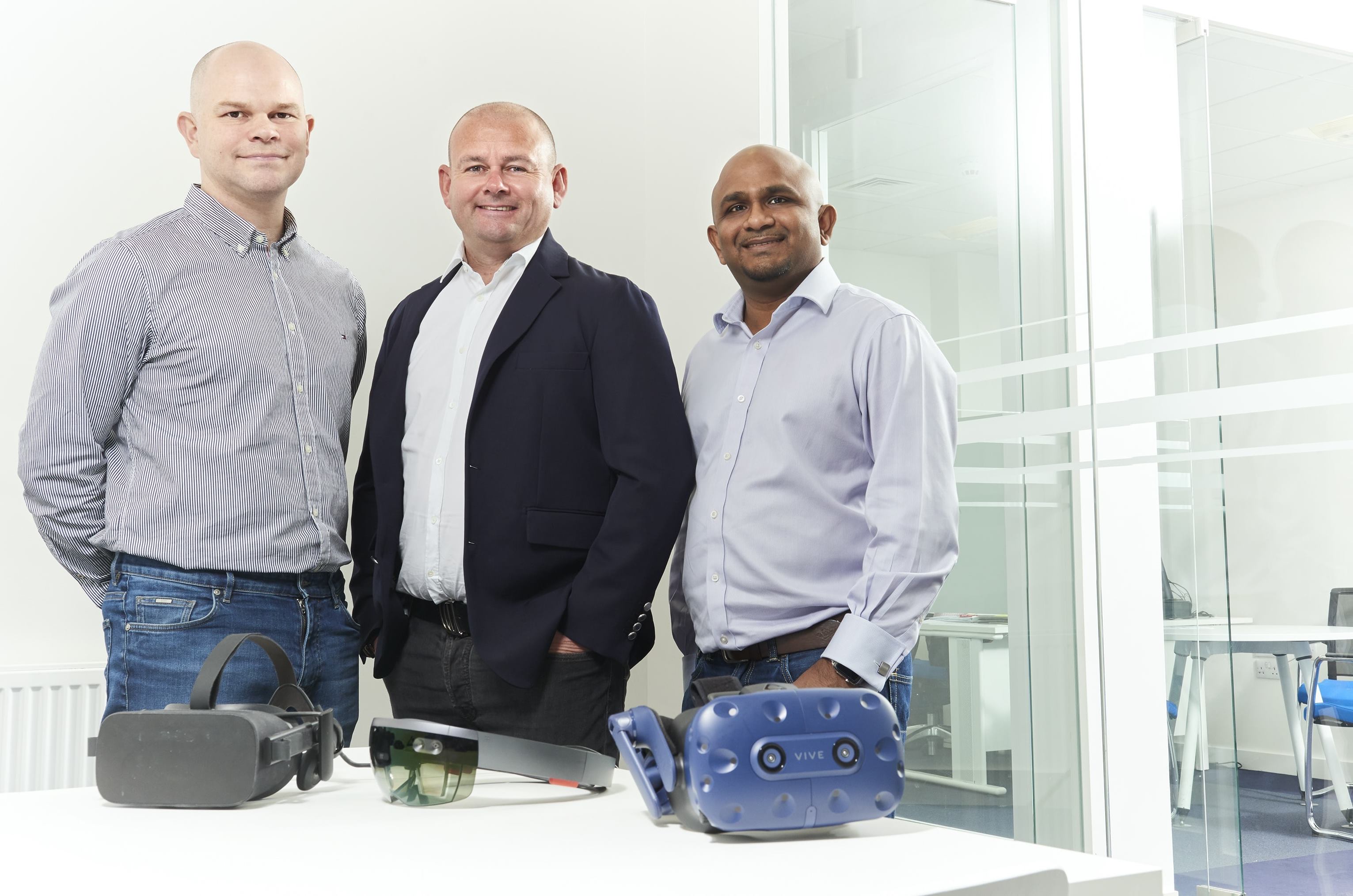 Left to right Richard Coates Paul Stonebanks OBE and Dinesh Kumar celebrate 3T Energy Group's acquisition of Neutron.