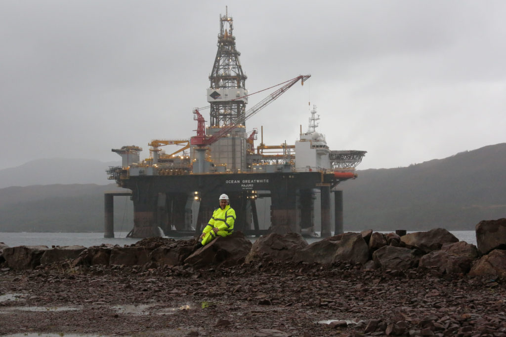 The newly revamped Kishorn dry dock is among projects which have benefited from previous funding rounds. Pictured is Kishorn Port director Simon Russell with the Ocean Greatwhite oil rig. PIC: Peter Jolly