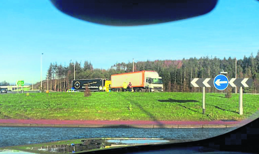A lorry overshoots the road and ends up on the AWPR roundabout
Pic by Joe Churcher
