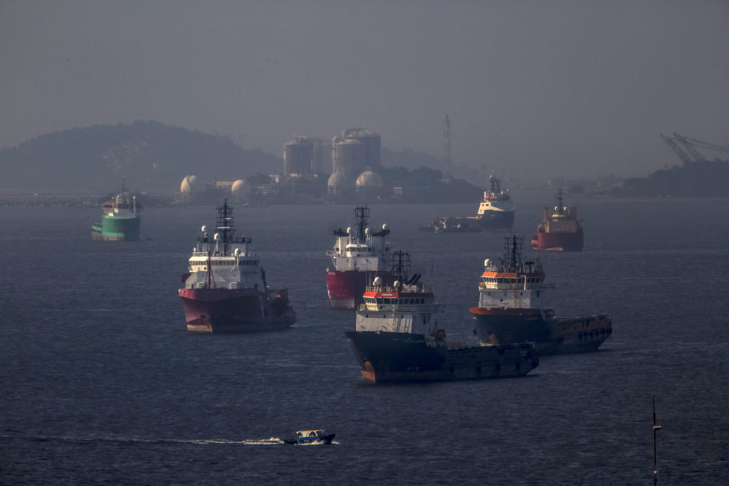 Idle supply vessels float in Guanabara Bay