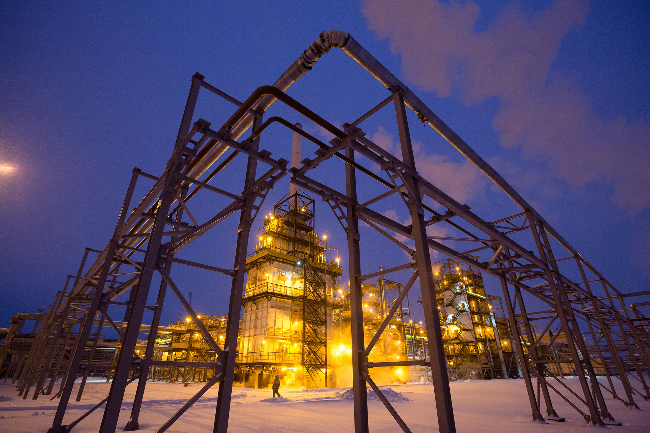 Lights illuminate the low-temperature isomerization unit at the Novokuibyshevsk oil refinery plant, operated by Rosneft PJSC, in Novokuibyshevsk, Samara region, Russia, on Wednesday, Dec. 21, 2016.