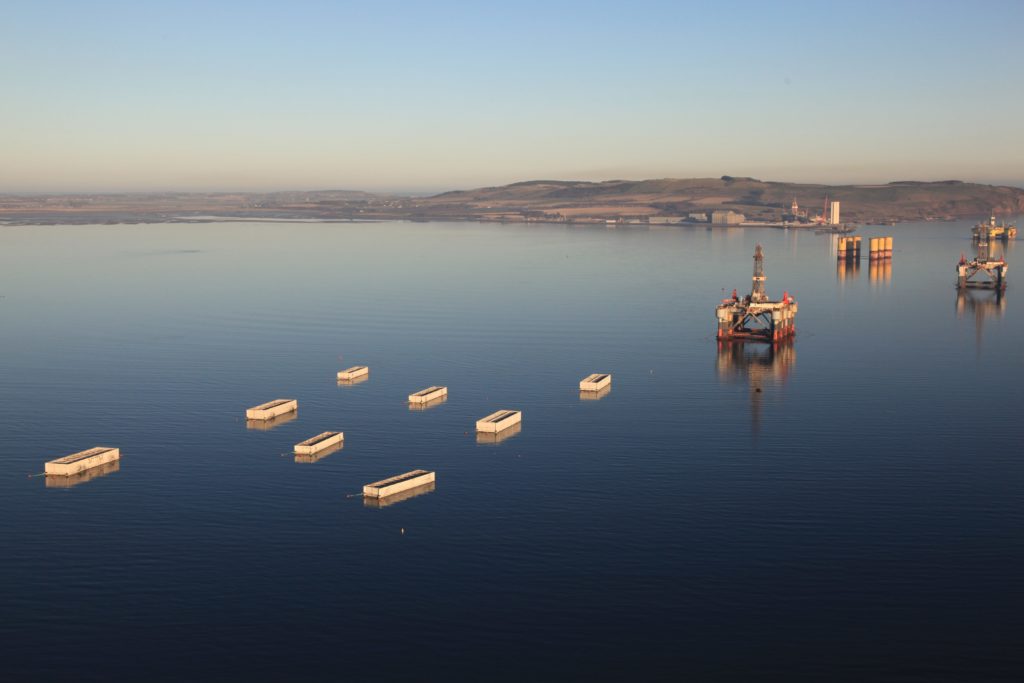 The first of the 22 concrete caissons has left Cromarty Firth on a 180-nautical mile journey to Aberdeen harbour