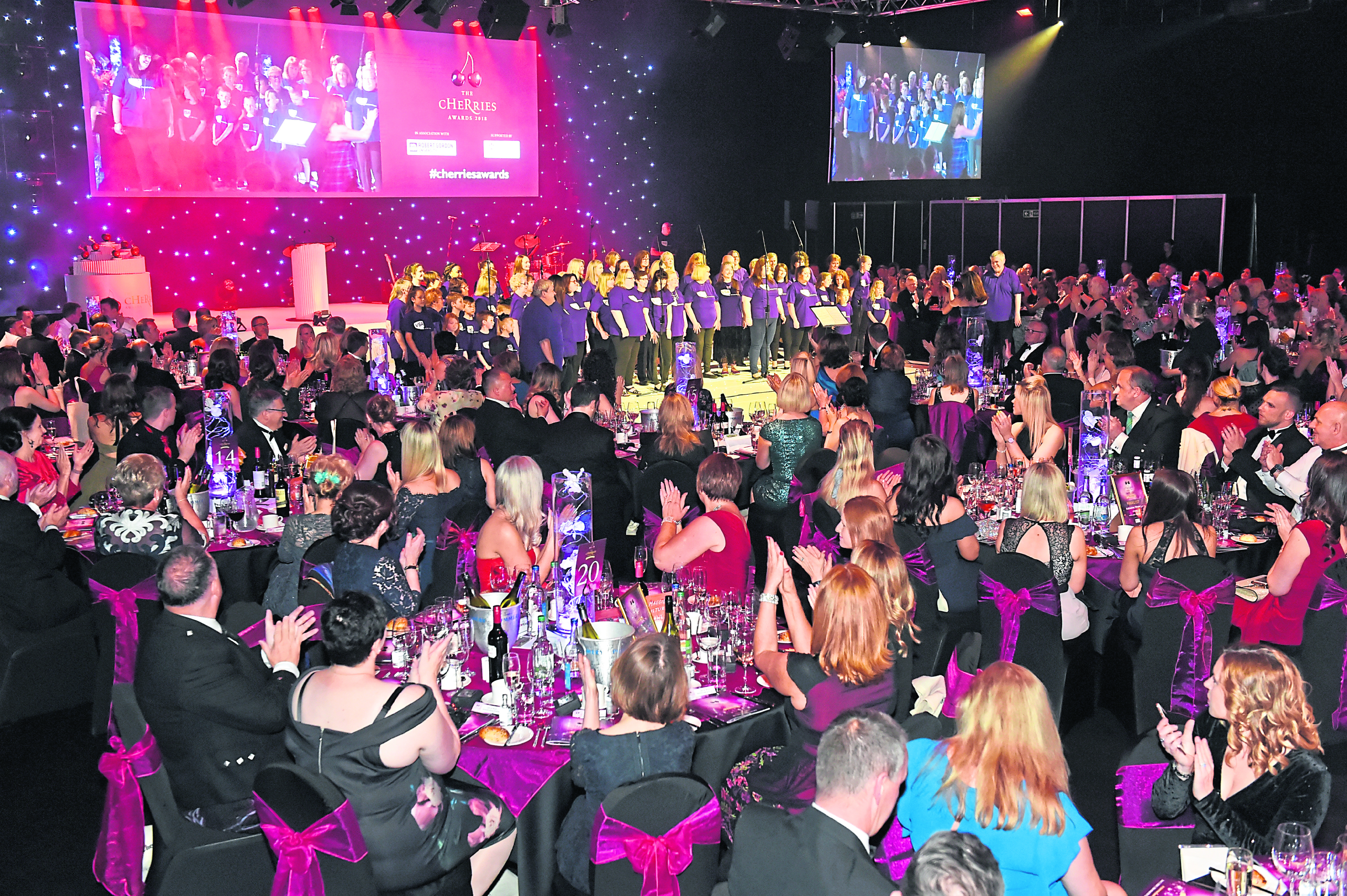 Ceremony: The VSA choir perform at last year’s event at the AECC. Photograph by Kenny Elrick