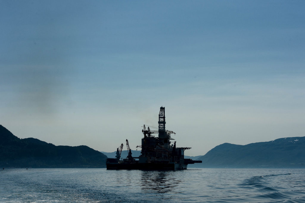 An oil drilling platform sits on board the world's largest construction vessel, the Pioneering Spirit, in the Bomla fjord near Leirvik, ahead of its transportation to the Johan Sverdrup oil field, Norway. Photographer: Carina Johansen/Bloomberg