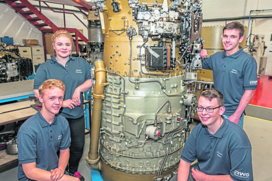 (from l to r) Jamie Ritchie (Apprentice Inspector), Mollie Paterson (Apprentice Inspector), Ryan Hanlon (Apprentice Engine Tester) and Steven Bain (Apprentice Fitter).
Caption
.something like:
RWGs apprentices in the Dyce in-house training facility?
Keith Findlay
Deputy Business Editor
Tel: 01224 343326
or (mobile) 07833 241565