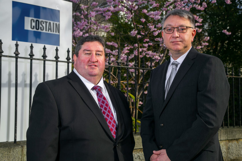 Sean Close, left, upstream director, and Steve Carter, project director, to Costain’s Aberdeen office