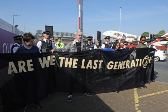 Extinction Rebellion demonstrators at London Heathrow airport.