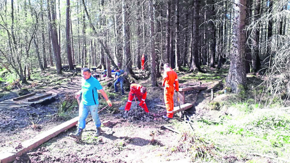 Volunteers at work at Crathes Castle grounds.