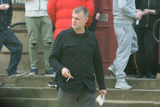 Peter McPhail is pictured leaving Elgin Sheriff Court.