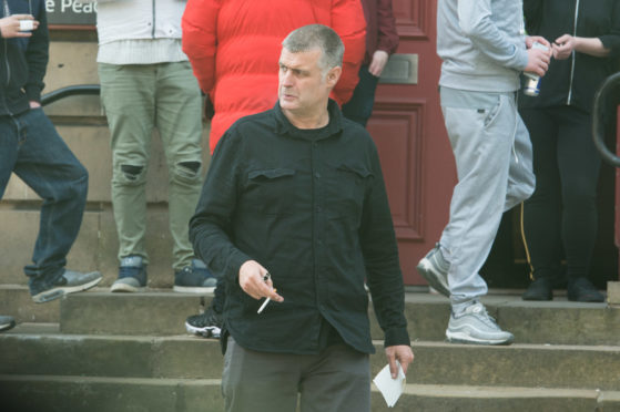 Peter McPhail is pictured leaving Elgin Sheriff Court.